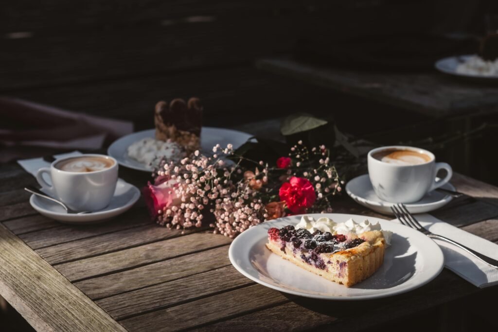 blackberry custard pie and coffee on table